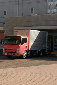 Truck in Front of a Warehouse